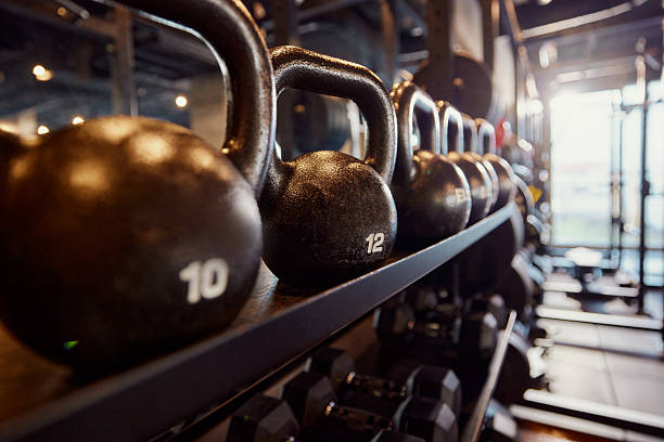 istock Kettlebells on a rack in a gym! 2210186206