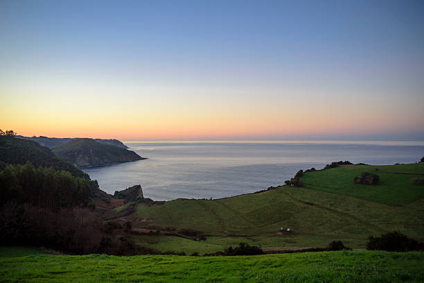 Seashore bay at sunset in Asturias