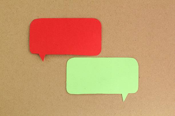 istock two examples of green and yellow conversation columns. Comic speech balloon. paper speech bubble. conversation concept 2210187543