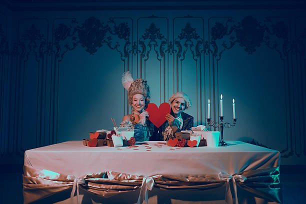 istock Elegant couple in baroque attire preparing romantic decorations in an ornate setting under neon lighting 2210192743