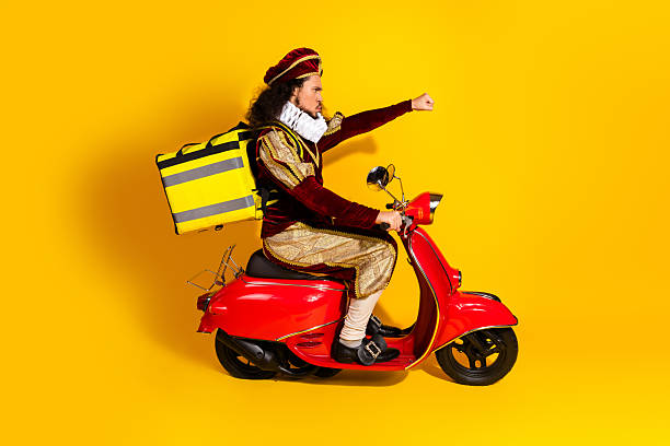 istock Modern Delivery in Historic Costume with a Bright Yellow Background 2210197012