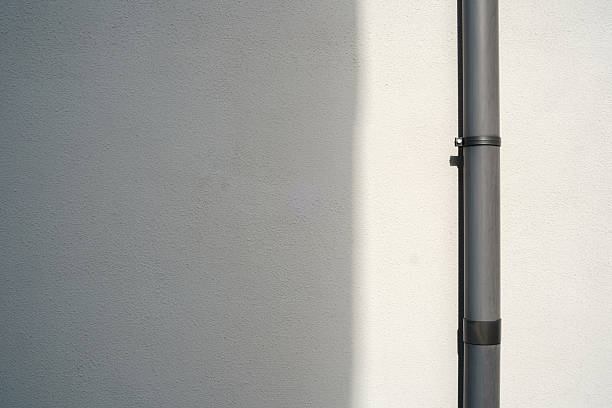 Shadow Falling On Wall In Darkroom