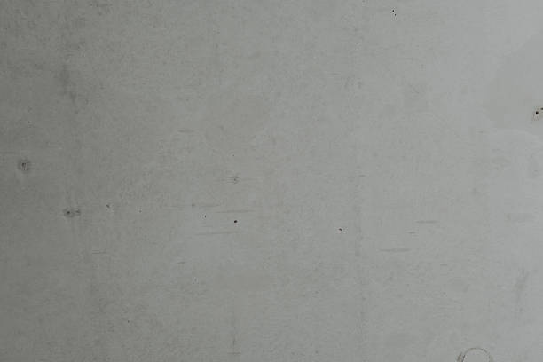 istock Simple gray concrete wall with subtle texture and slight imperfections visible 2210197465