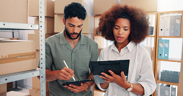istock Team, shipping or people with checklist on tablet for inventory check or stock count. Distribution, planning or supply chain for logistics discussion, ecommerce or clipboard for business in warehouse 2210198290