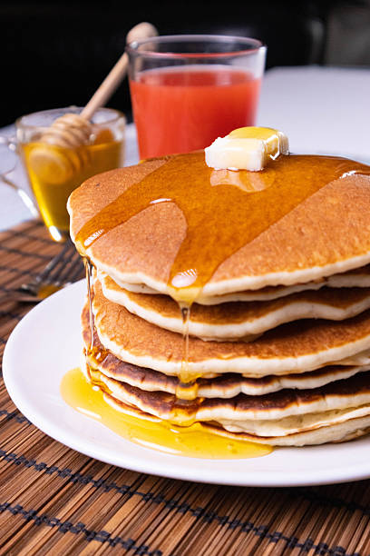 istock Pancake breakfast with honey and granola 2210203767