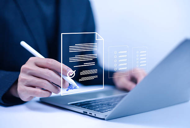 istock Businessman signing electronic document on digital document. Electronic signature concept. Electronic signature concept. 2210205261