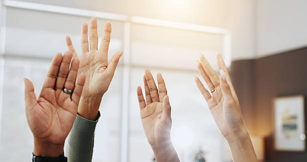 istock Teamwork, hands raised and support with business people in office for workshop, solidarity and success. Achievement, trust and collaboration with group of employees for celebration and community 2210208037