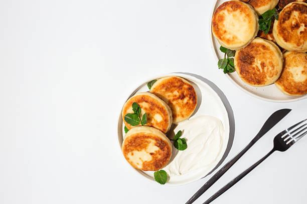 Homemade cottage cheese pancakes with sauce