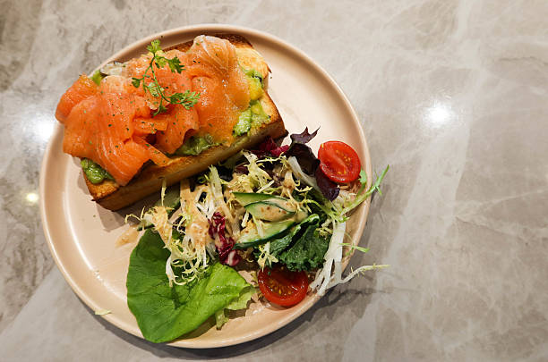 avocado salmon toast with salad on the side