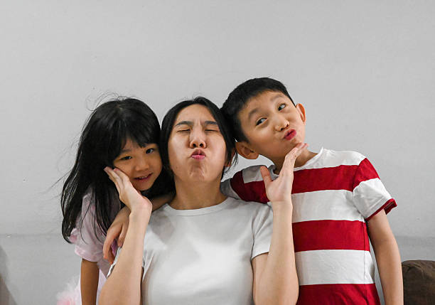 Asian mother and children