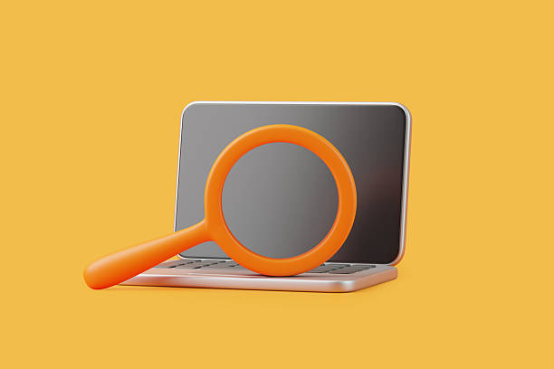 Magnifying glass placed in front of a laptop screen, symbolizing search, research, and data analysis. 3D render illustration