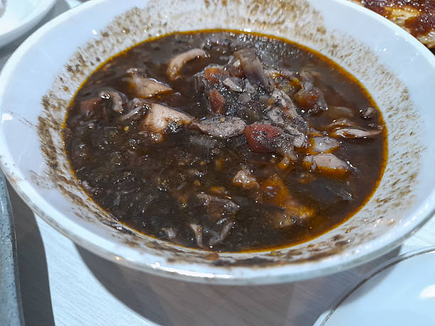 istock Squid Black Soup (Tumis Cumi Hitam) or stir-fried squid in black ink 2210218469