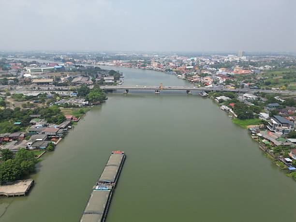 istock Aerial view of river and cityscape with bridge. 2210222009