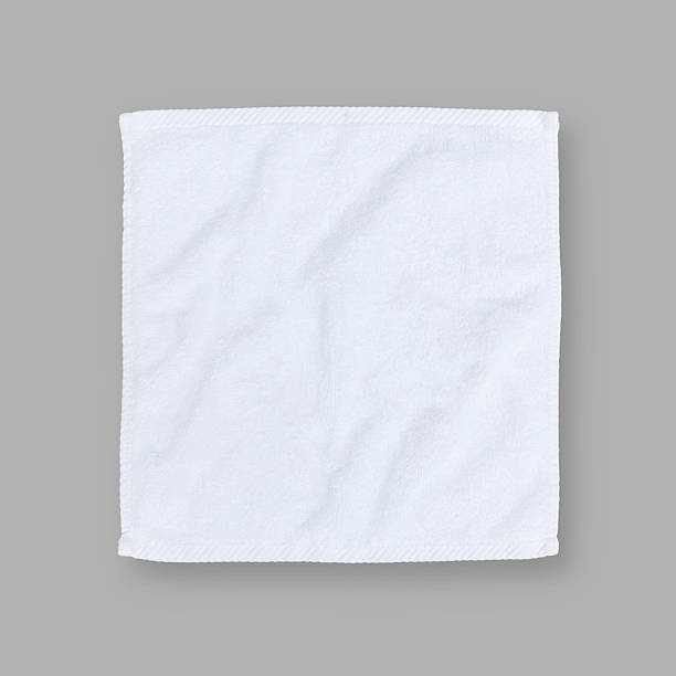 istock White cotton towel mock up template square size fabric wiper isolated on grey background with clipping path, flat lay top view for hand towel and face cloths mockup template 2210225319
