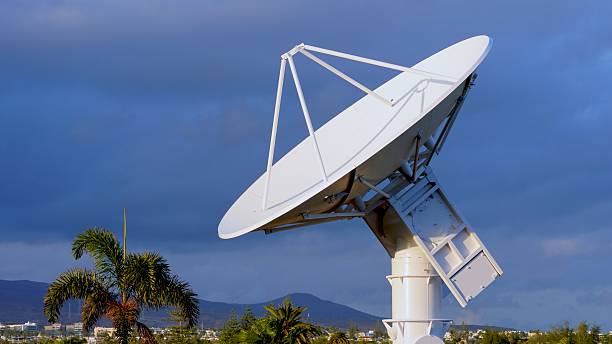istock Parabolic antenna pointing at the sky, capturing data for telecommunications 2210225632