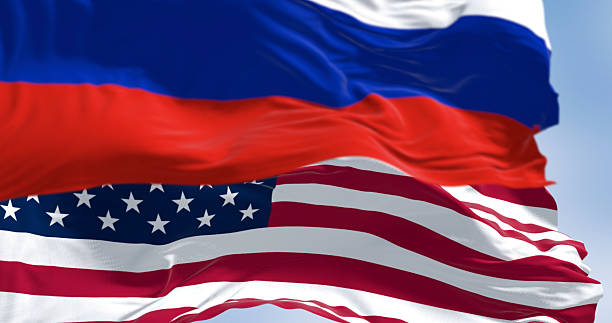 istock Russian and American flags waving side by side in wind. 3D render 2210231001
