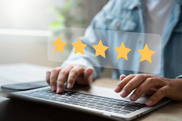 istock Experience excellent customer service, User give five star rating on online application, Positive feedback, Happy, Smiley face icon. Customer Reviews in Digital Survey, Satisfaction. 2210234580
