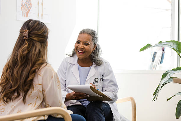istock Doctor and Patient Talking in a Doctor's Office 2210235270