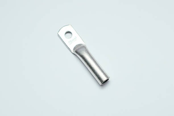 istock Closed-end ring terminal. Crimp terminals for electrical wires, tools for electricians. electrical terminal, electronic work on white 2210235632