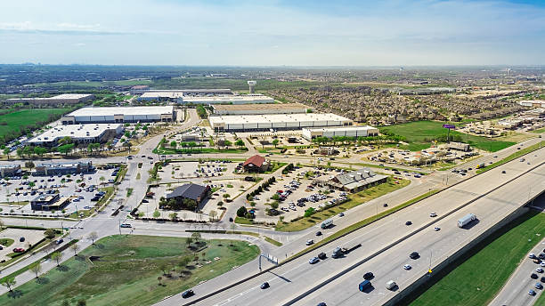 istock Busy traffic on Sam Rayburn Tollway, State Highway 121, frontage road in The Colony, Denton County, Texas, fast growing suburbs Dallas Metroplex, restaurant, shopping mall, residential houses 2210239577