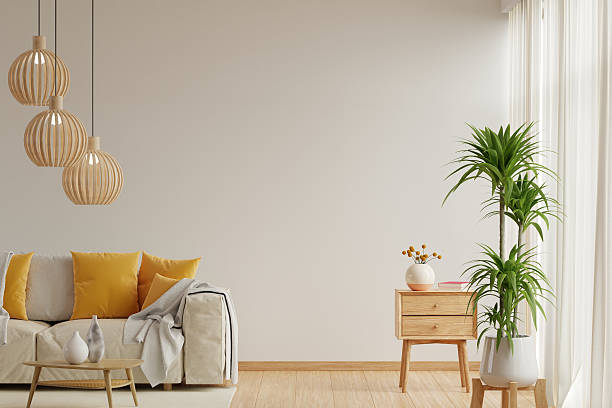istock Modern interior living room features an sofa and decorative accessories against a white-colored wall- 3D rendering 2210240404