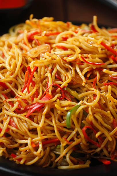 istock Delicious Veg Momos and Noodles Served in Rustic Style 2210246524