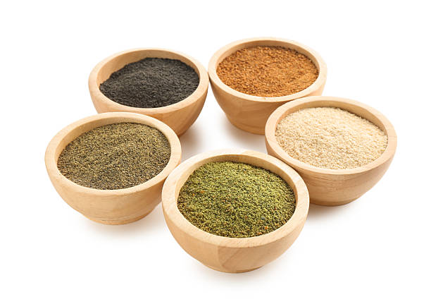 istock Different superfood powders in bowls isolated on white 2210249116