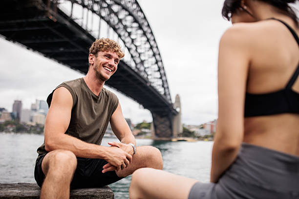 istock Couple Enjoying Break by River 2210252364