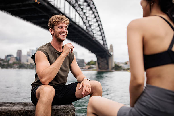 istock Couple Enjoying Break by River 2210252403