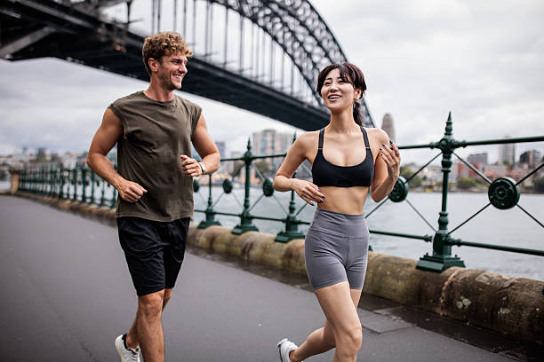 istock Fit Couple Jogging Together 2210252783