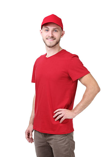 istock Delivery man in red uniform on white background 2210253195