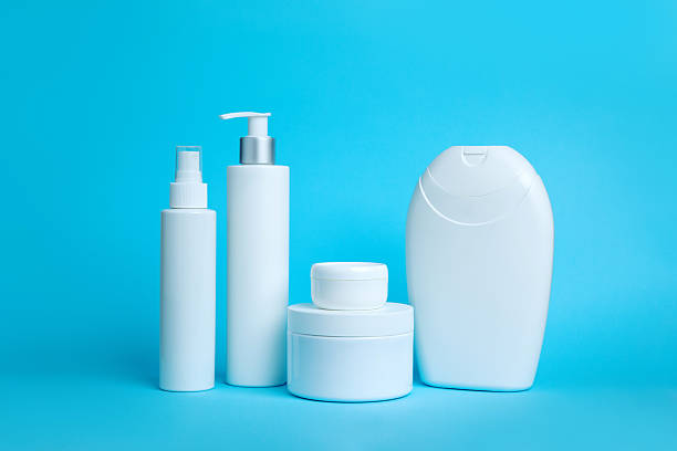 istock Set of white cosmetic bottles on blue background 2210256003