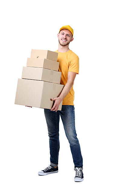 istock Delivery man with cardboard boxes on white background 2210256238