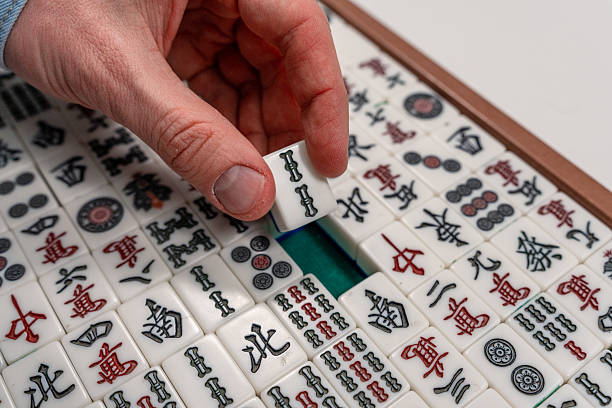 istock Manjong Board Game tiles on table 2210261089