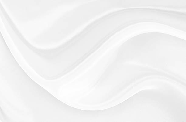 istock White gray satin texture that is white silver fabric silk background with beautiful soft blur pattern natural. 2210261619