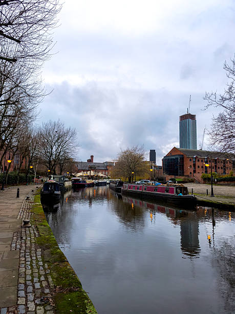istock A canal with a few boats floating on it 2210264288