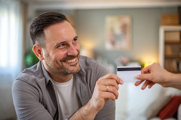istock Couple sharing money 2210265317