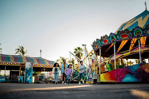Magic City Park, Tashkent, Uzbekistan – March 27, 2025, A fairytale castle & a fantasy town with colorful houses, cafes & entertainment, at a theme park at night