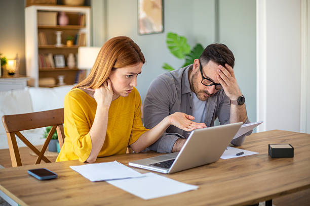 istock Couple discussing home finances 2210266749