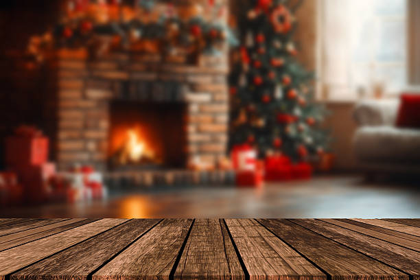istock Christmas and New year background with empty dark wooden deck table over christmas tree and blurred light bokeh. Empty display for product montage. Rustic vintage Xmas background. 2210267738