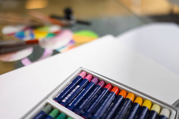 istock Top View of Oil Pastels on White Background 2210268405