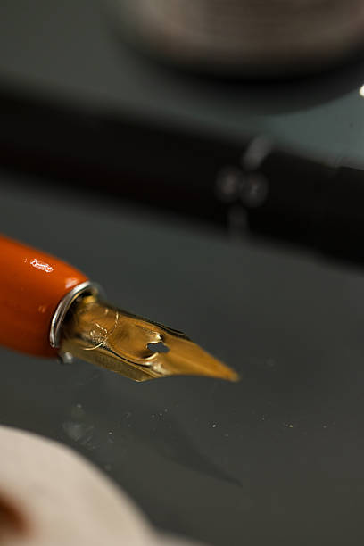 Red wax seal with fountain pen.