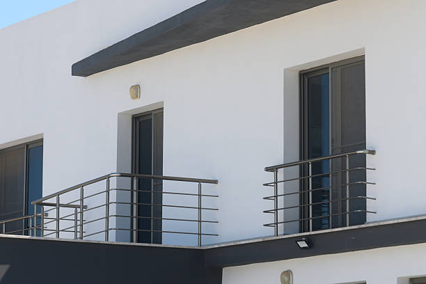 istock Modern architectural design featuring sleek balconies and minimalist style in a sunlit urban setting 2210278565