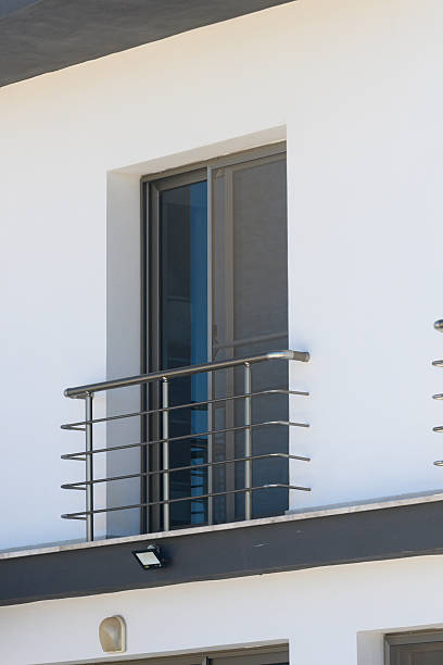 istock Elegant modern balcony showcasing sleek design and minimalist architecture on a sunlit day 2210278571
