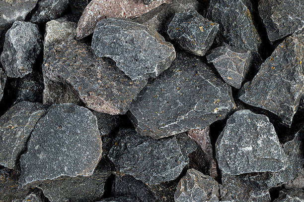 istock Volcanic basalt stone surface with rough texture, captured close-up 2210278692
