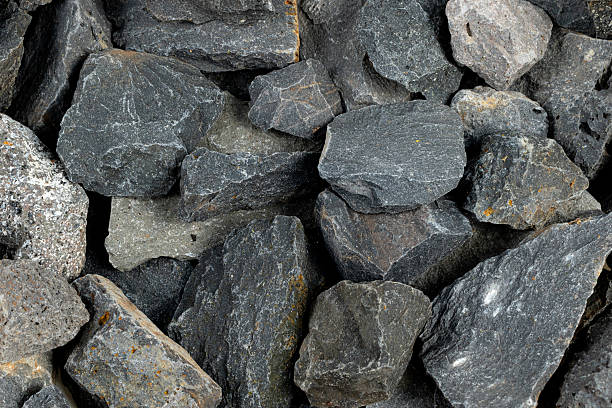 istock Volcanic basalt stone surface with rough texture, captured close-up 2210278696