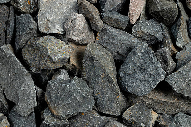 istock Volcanic basalt stone surface with rough texture, captured close-up 2210278709