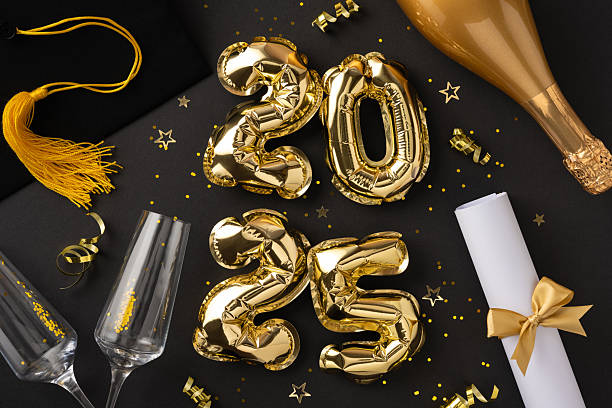 istock Golden themed graduation party setup featuring decorations, a diploma, and celebratory elements celebrating the year 2025 2210278843