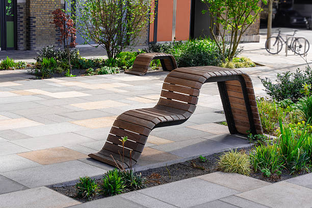 istock Modern Wavy Wooden Bench In Urban Space 2210278854