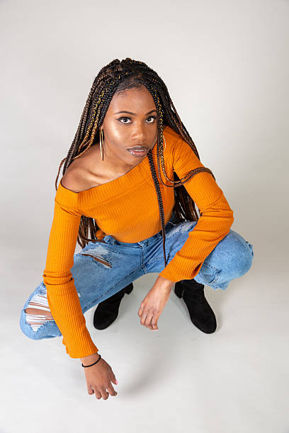 istock Young Black Woman posing in studio 2210287604